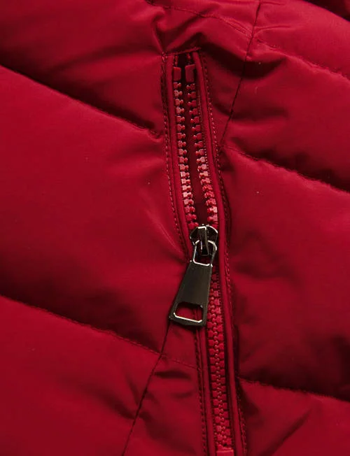 Női piros téli kabát cipzáras zsebekkel